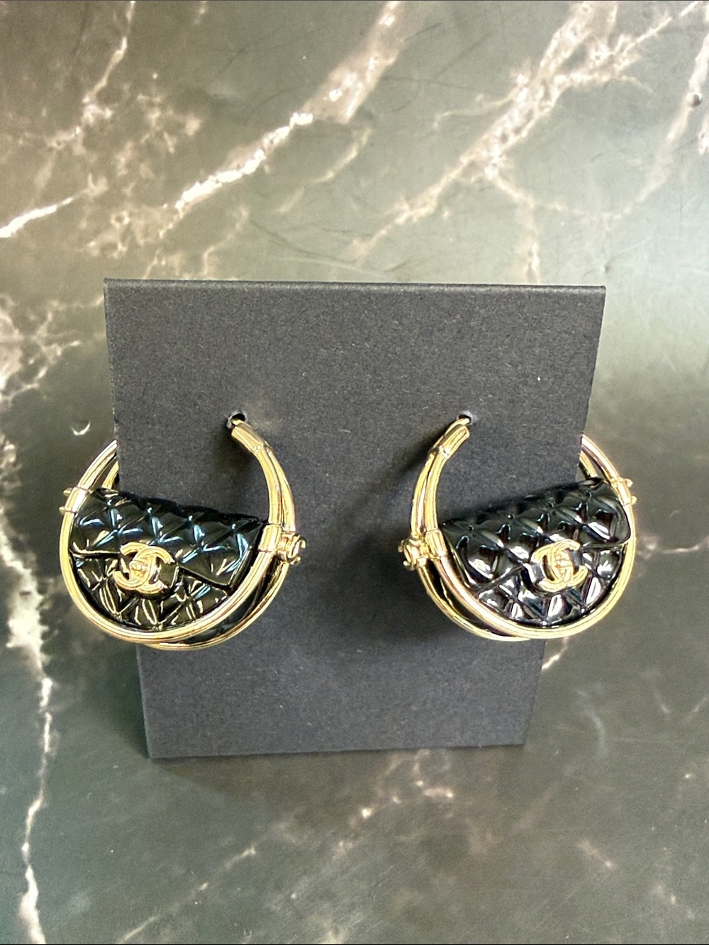 CHANEL Silver-Tone Hoops with Black Quilted Enamel CC Detail